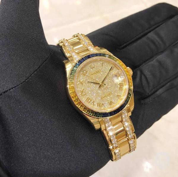 The luxury copy watches are decorated with diamonds.