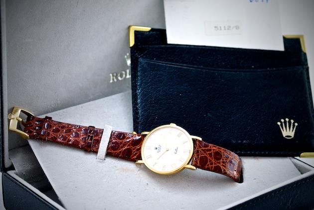 The 32 mm copy watches have brown leather straps.